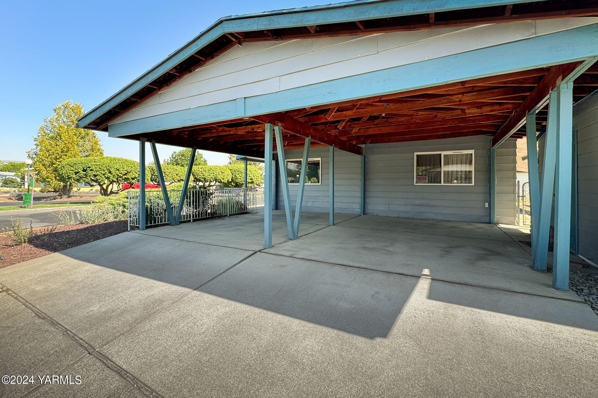 3701 Gun Club Road, Unit 54 Yakima, WA 98901 - Photo 5 of 17 a view of backyard with large tree