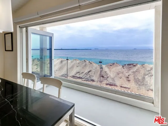 a view of a living room and furniture