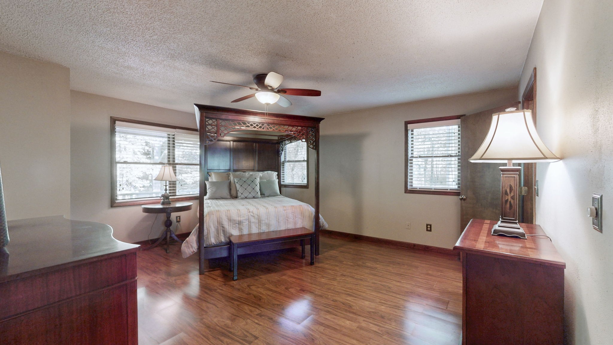 35 Davis Road Springville, TN 38256 - Photo 14 of 50 a bedroom with a bed and wooden floor