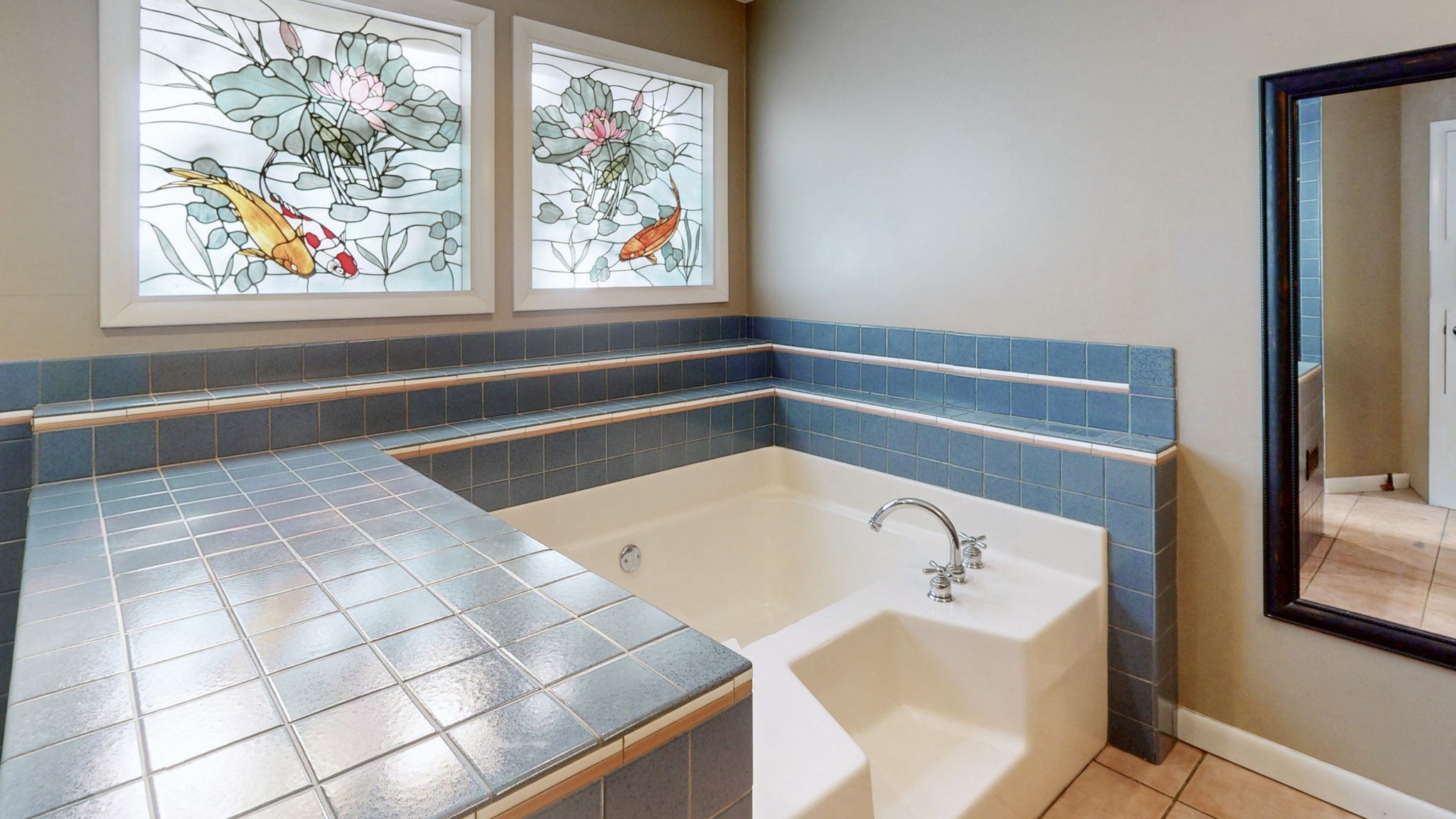 35 Davis Road Springville, TN 38256 - Photo 18 of 50 a bathroom with a bathtub and window