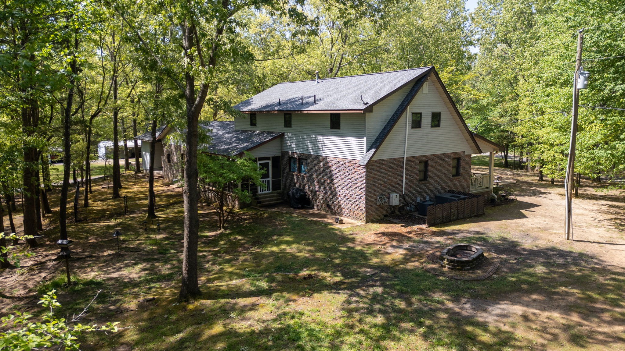 35 Davis Road Springville, TN 38256 - Photo 38 of 50 a view of a house with a yard