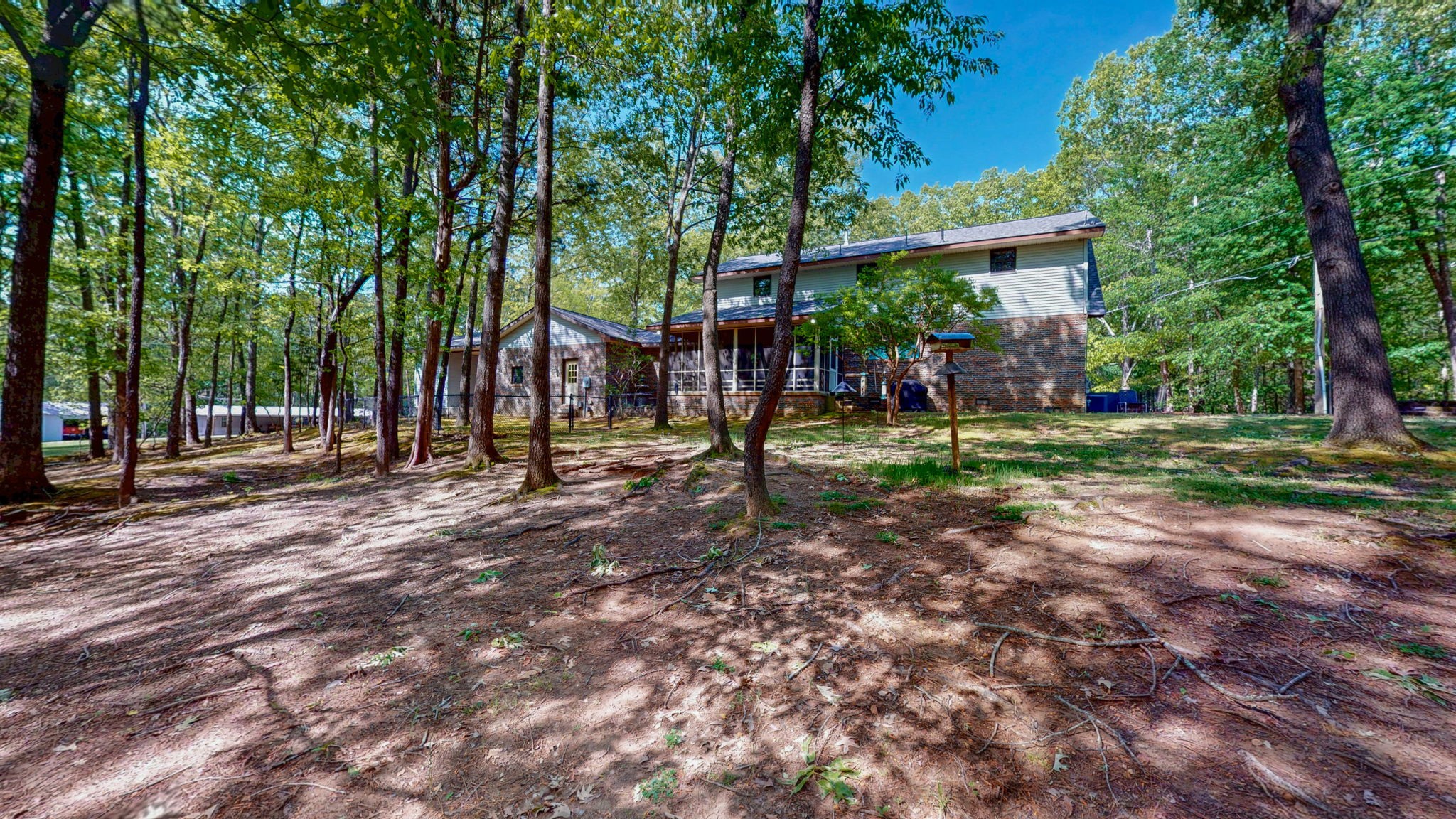 35 Davis Road Springville, TN 38256 - Photo 46 of 50 a view of outdoor space with deck and trees