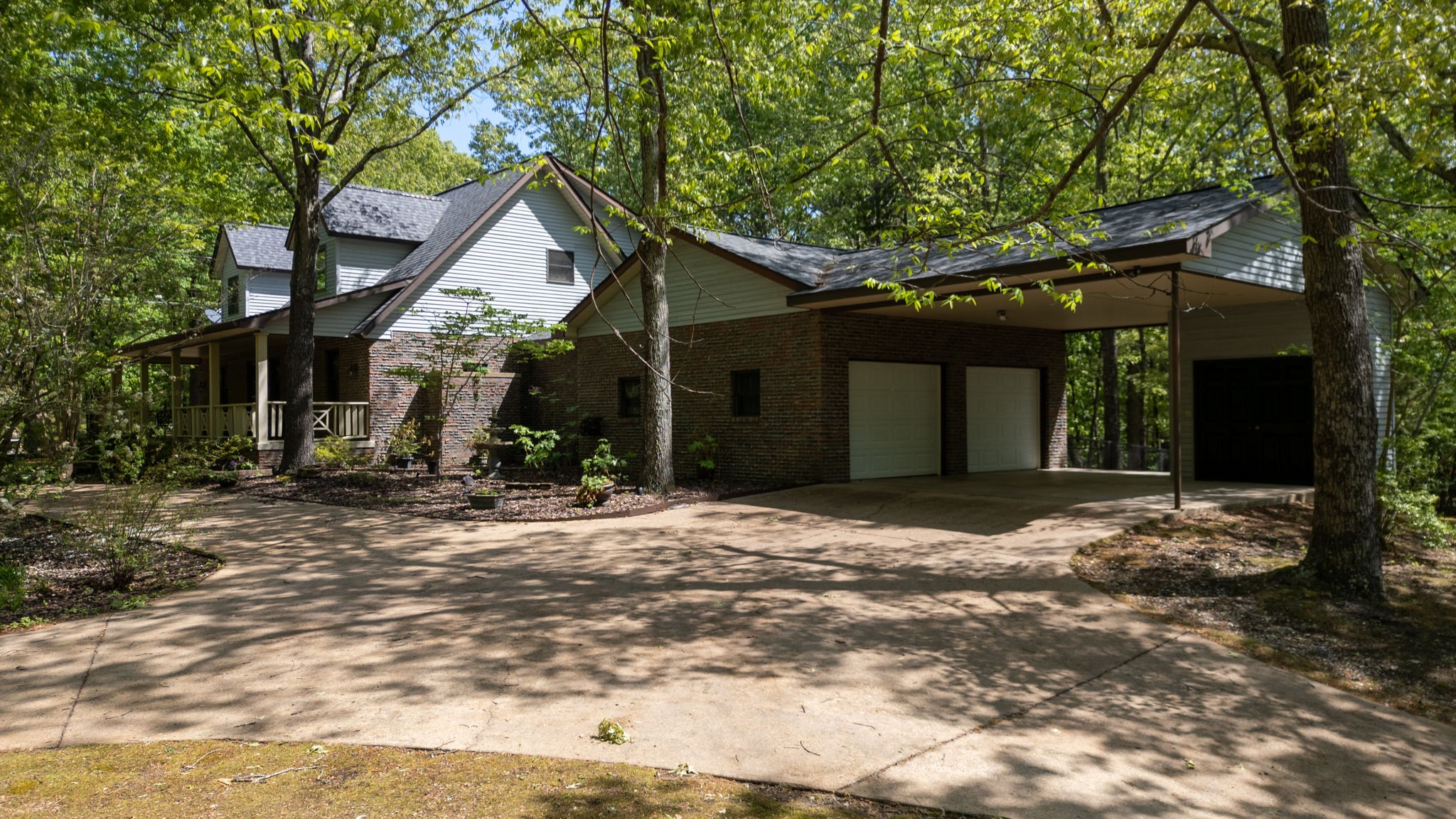 35 Davis Road Springville, TN 38256 - Photo 47 of 50 a view of a house with a yard and large tree