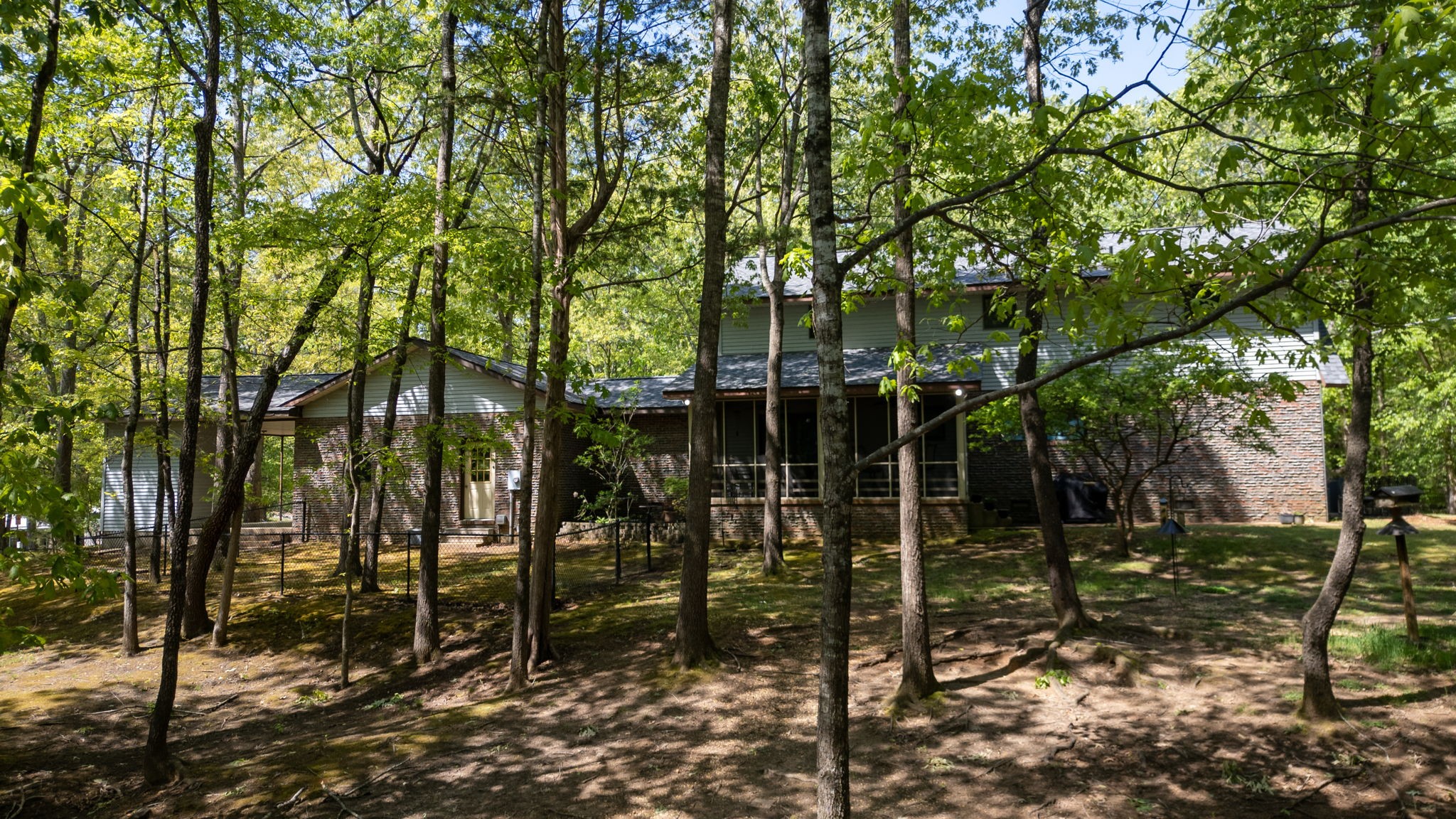 35 Davis Road Springville, TN 38256 - Photo 49 of 50 a backyard of a house with lots of green space