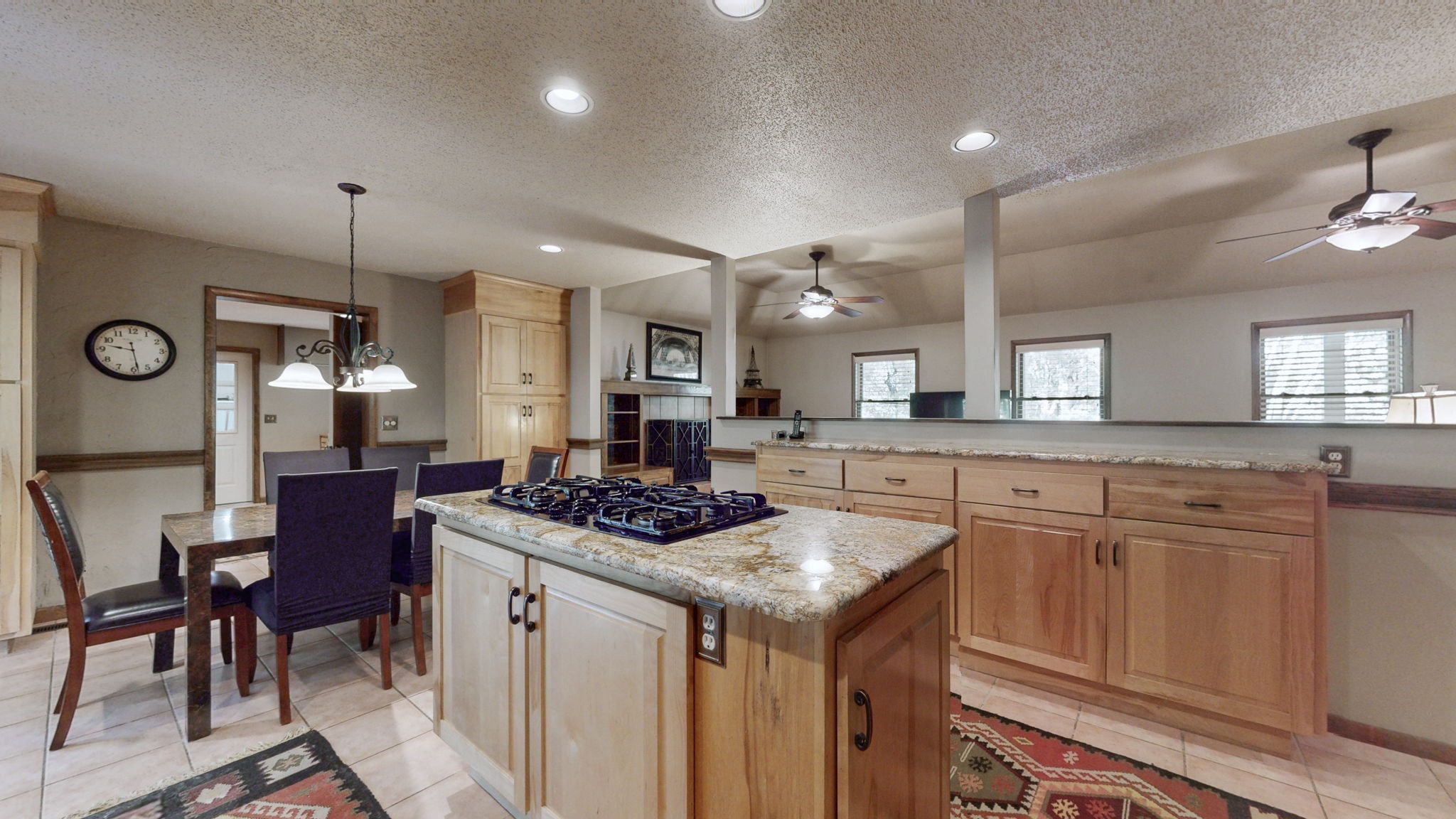 35 Davis Road Springville, TN 38256 - Photo 9 of 50 a kitchen that has a lot of cabinets in it and wooden floors