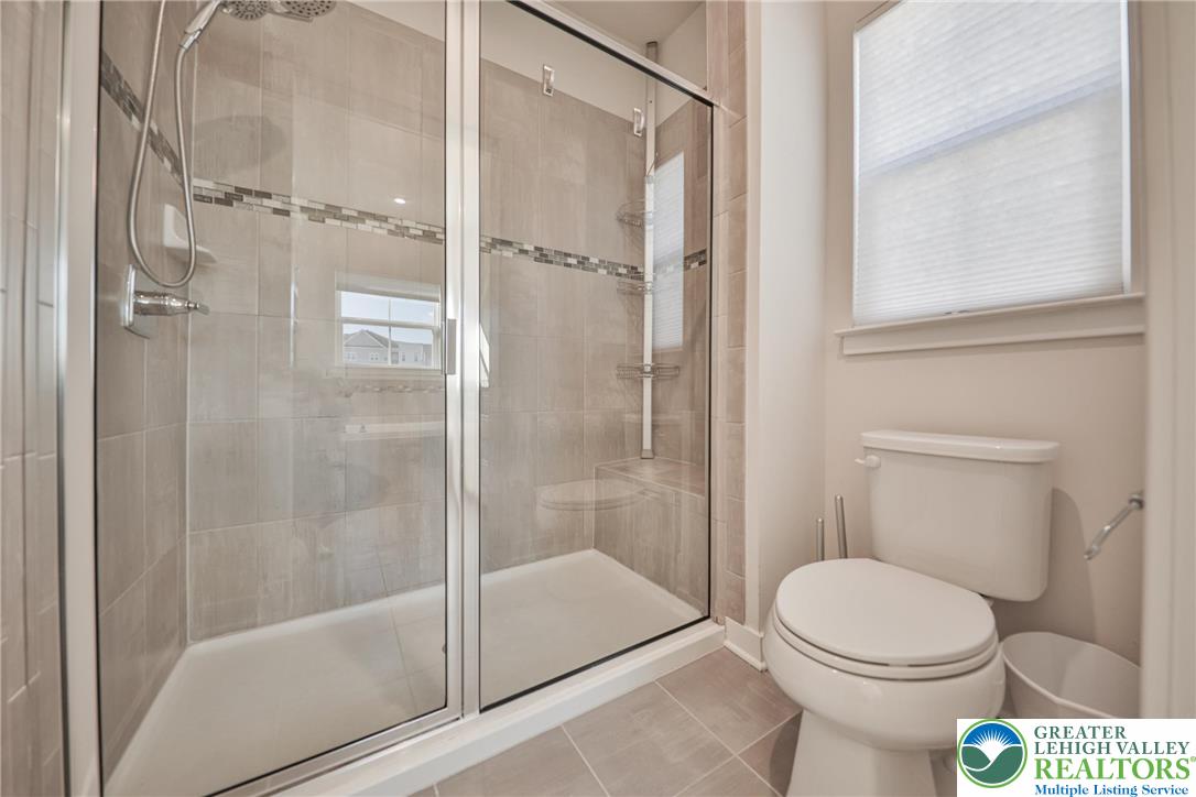 2364 Raya Way Easton, PA 18045 - Photo 21 of 40 a bathroom with a toilet and a shower