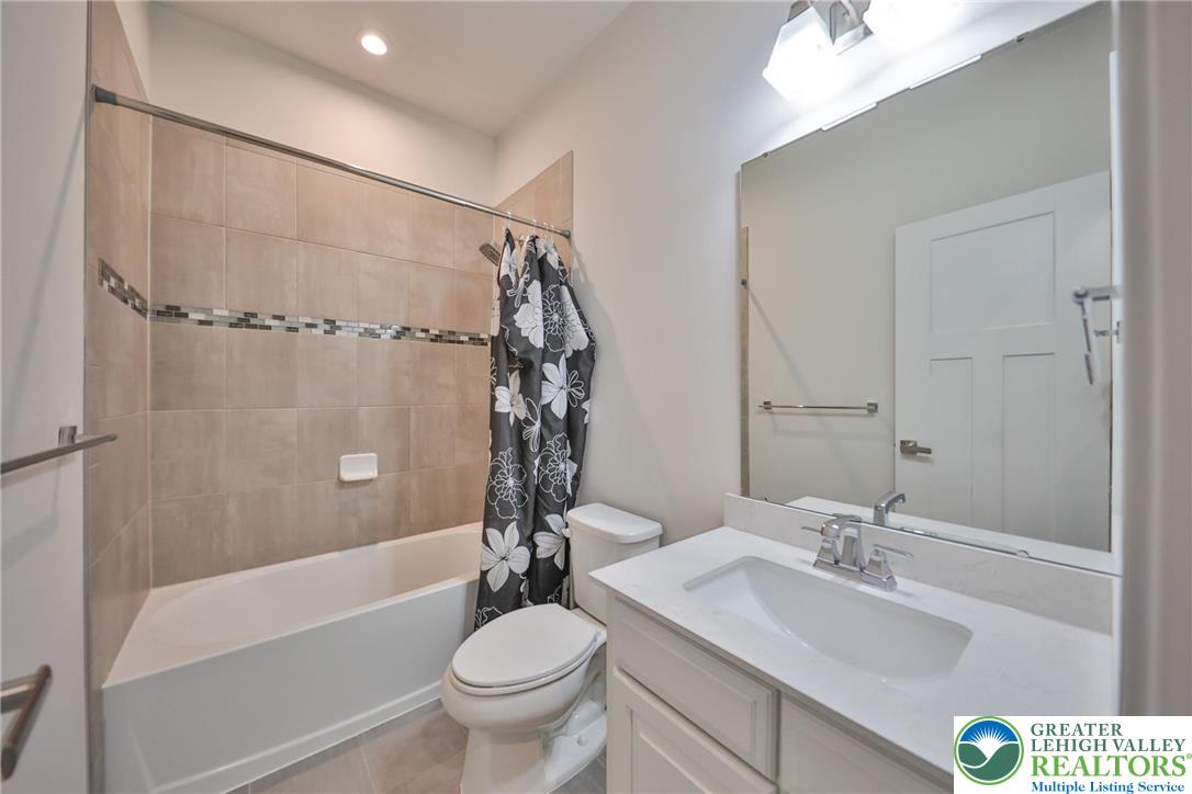 2364 Raya Way Easton, PA 18045 - Photo 23 of 40 a bathroom with a sink toilet and shower