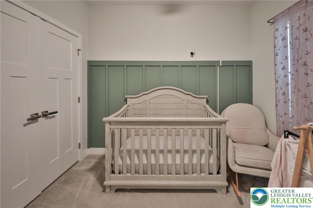 2364 Raya Way Easton, PA 18045 - Photo 27 of 40 a bedroom with a bed and a mirror