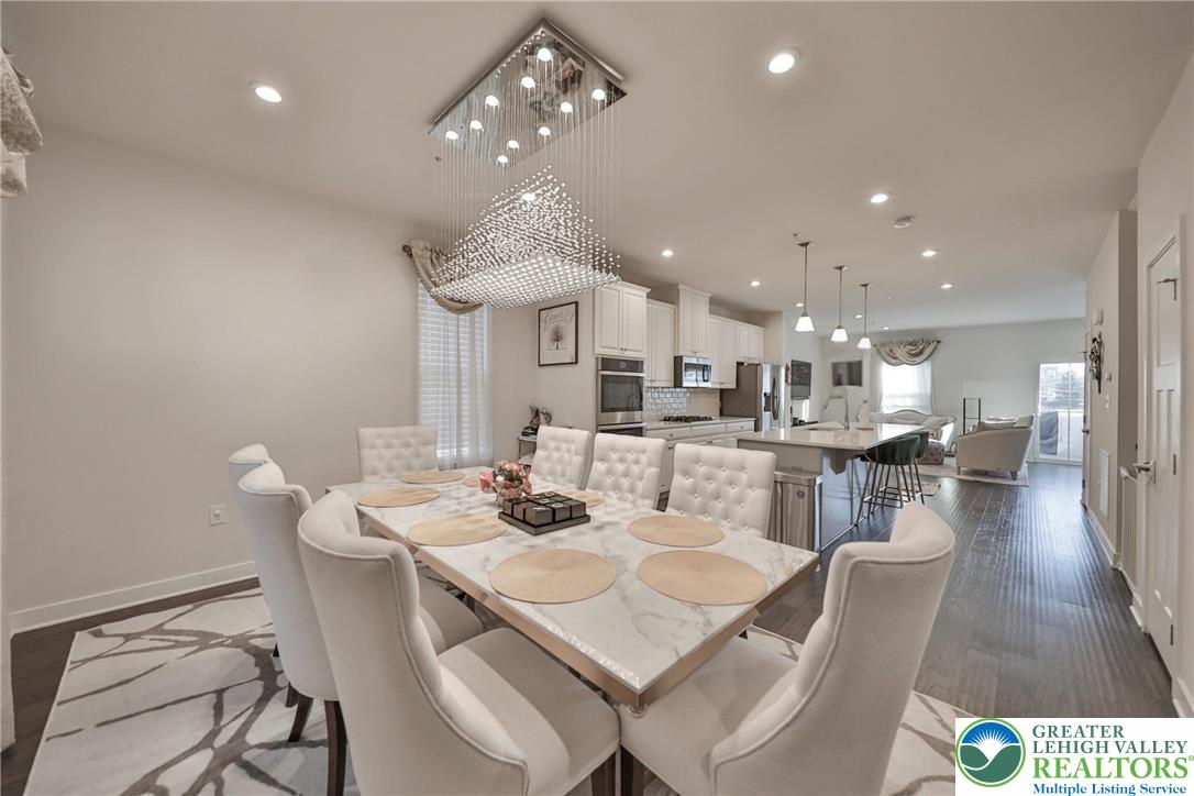 2364 Raya Way Easton, PA 18045 - Photo 8 of 40 a view of a dining area with furniture and wooden floor