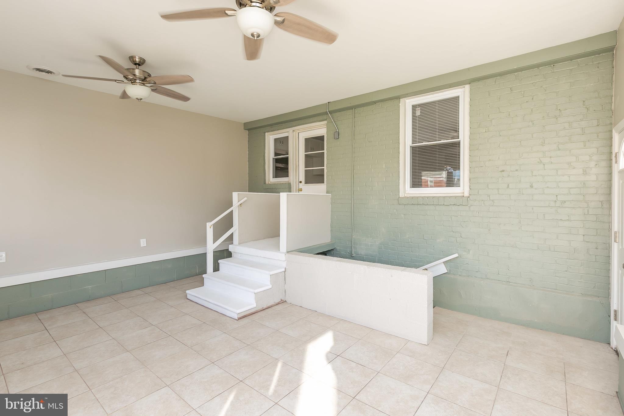 5912 Glenkirk Road Baltimore, MD 21239 - Photo 29 of 32 Rear 4 season family room/sunroom addition