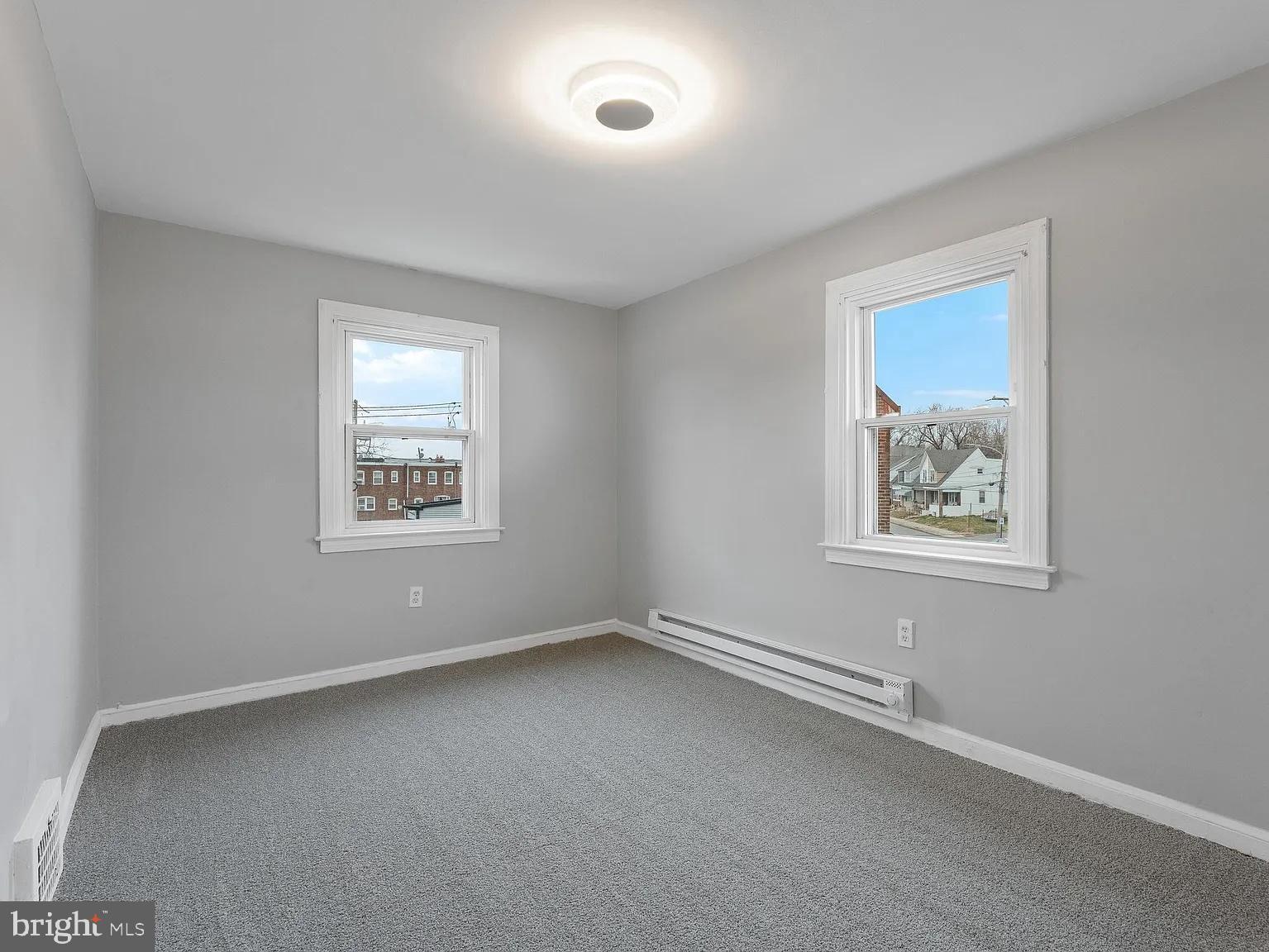 1006 Butler Street Chester, PA 19013 - Photo 16 of 31 an empty room with a window