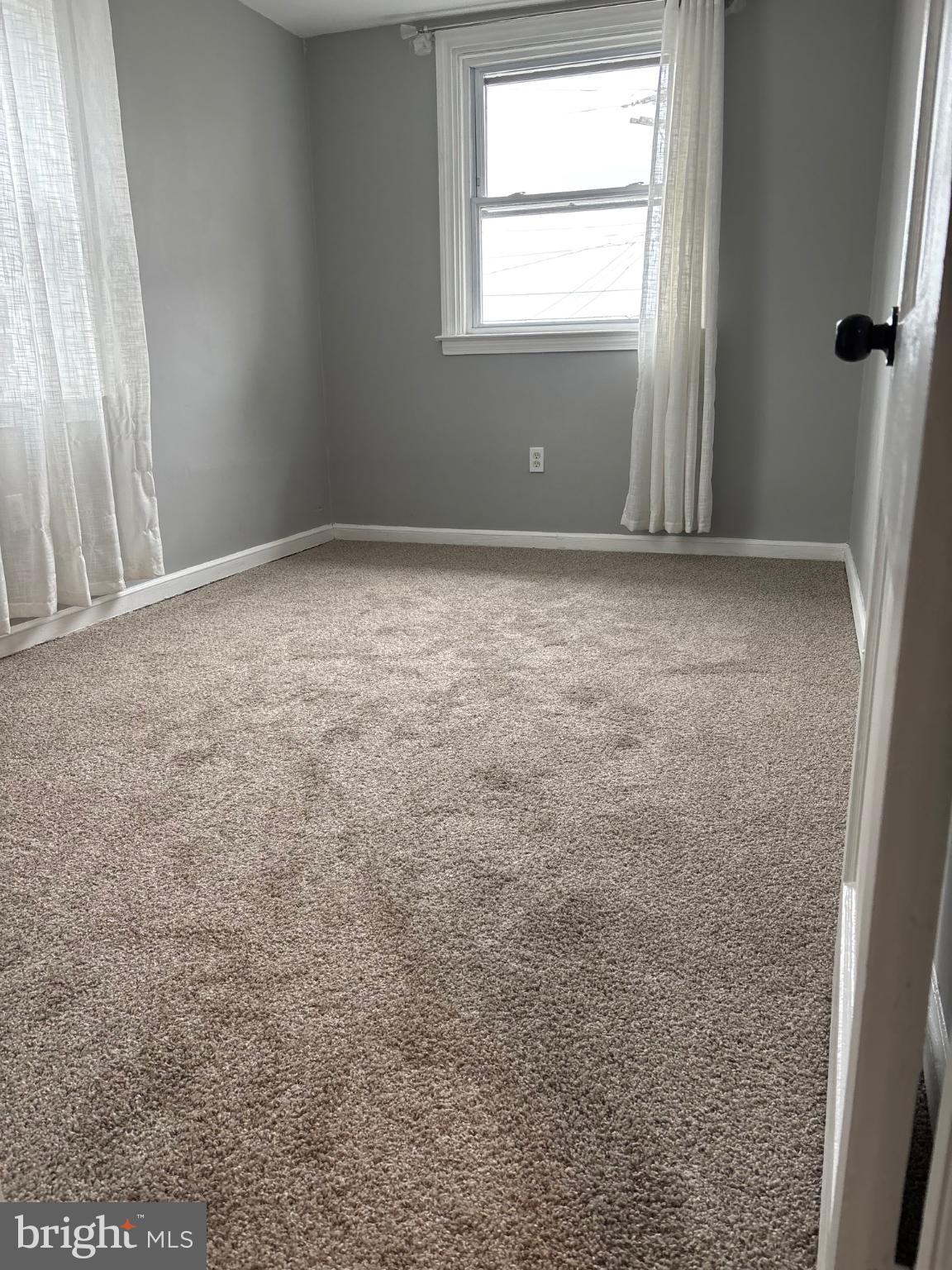 1006 Butler Street Chester, PA 19013 - Photo 22 of 31 an empty room with windows