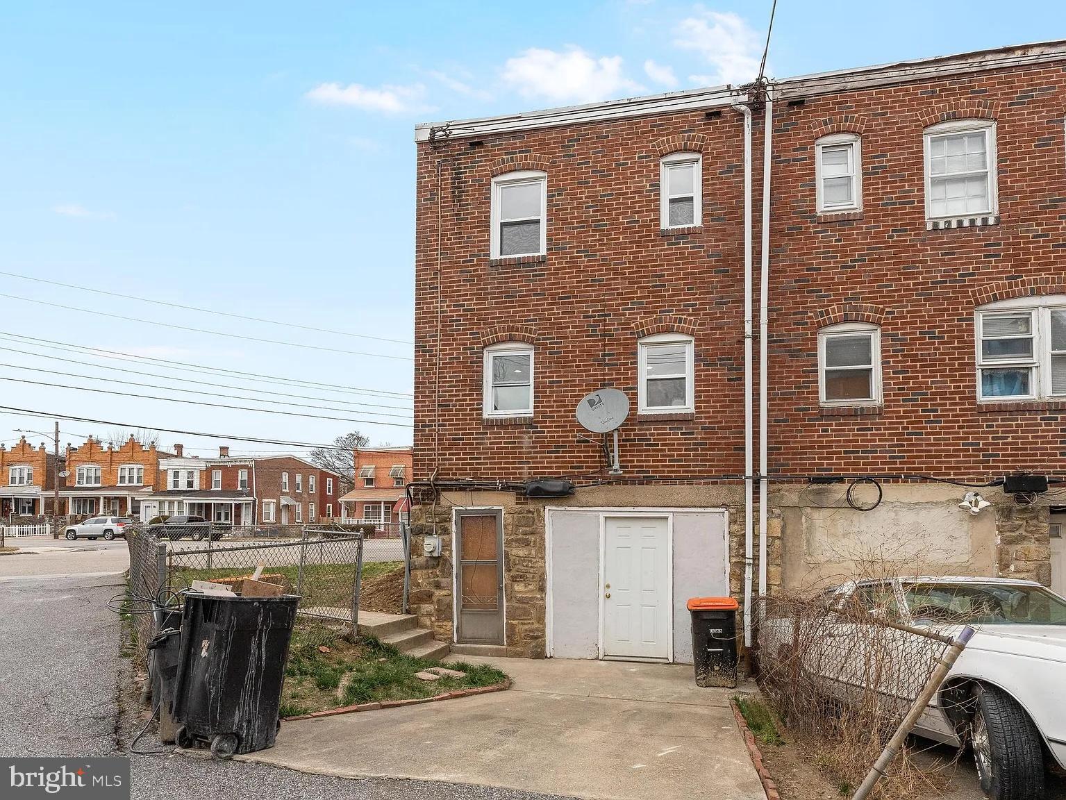 1006 Butler Street Chester, PA 19013 - Photo 30 of 31 a front view of a house with parking space