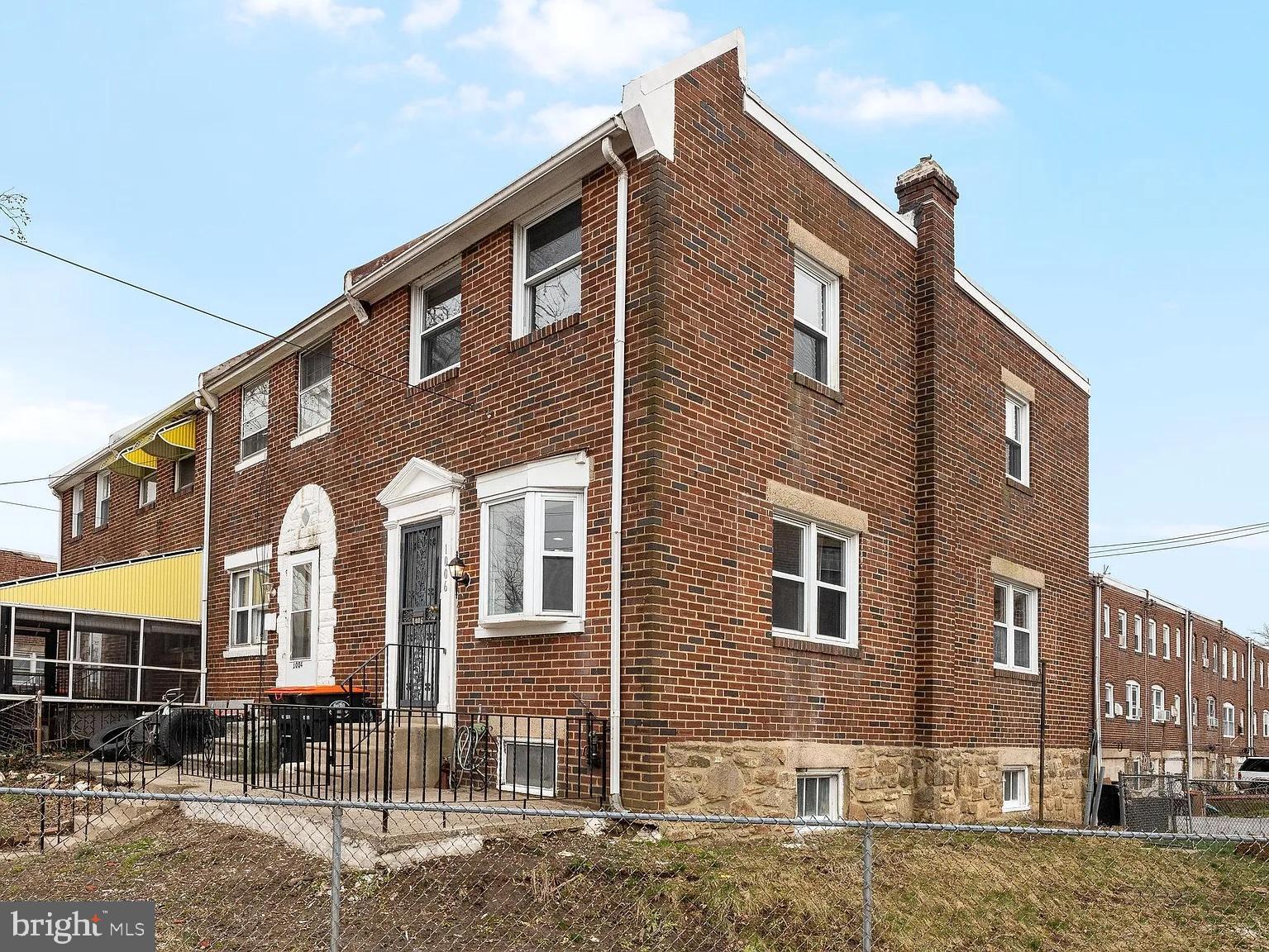 1006 Butler Street Chester, PA 19013 - Photo 7 of 31 a front view of a house with street