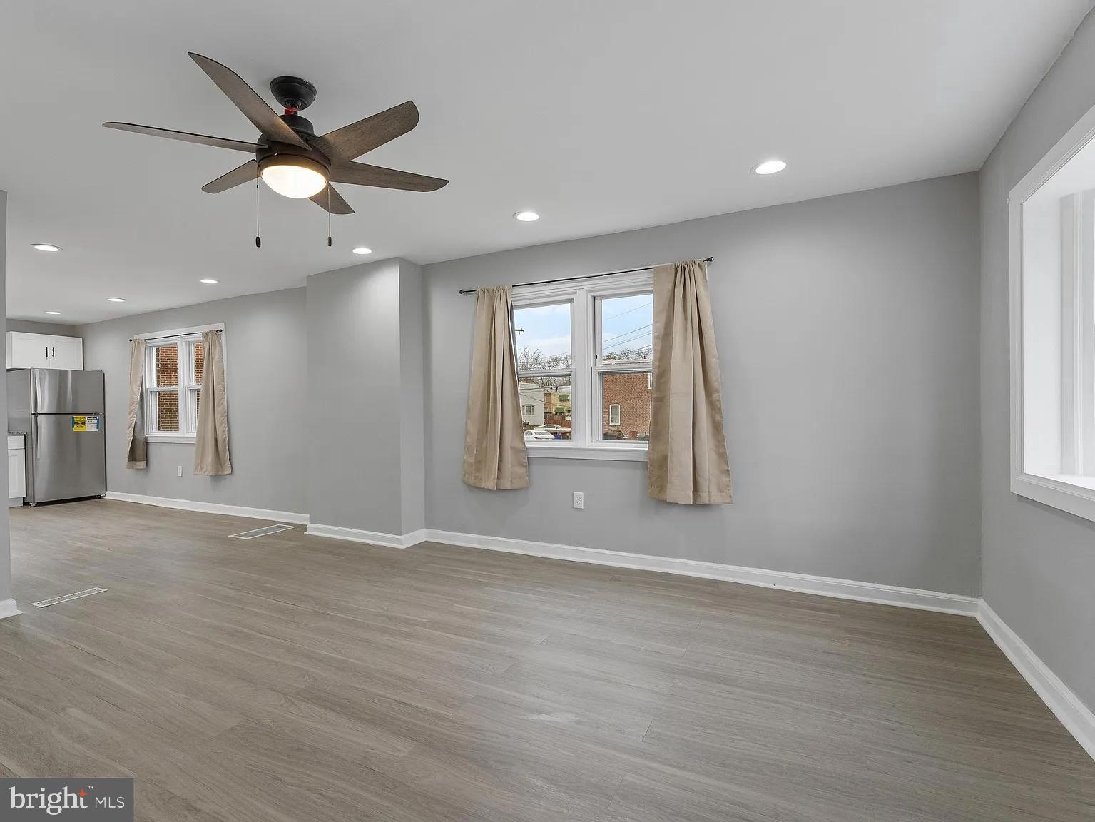 1006 Butler Street Chester, PA 19013 - Photo 10 of 31 a view of an empty room with a window
