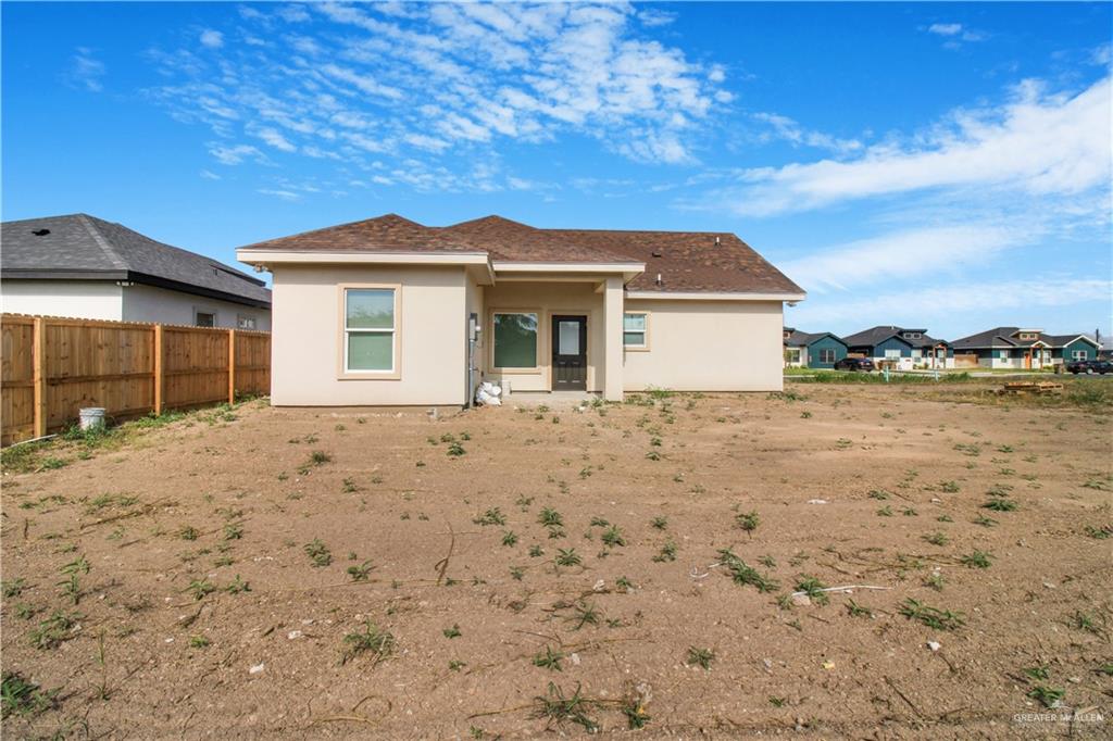 2126 Trinity Street Donna, TX 78537 - Photo 13 of 15 a front view of a house with a yard