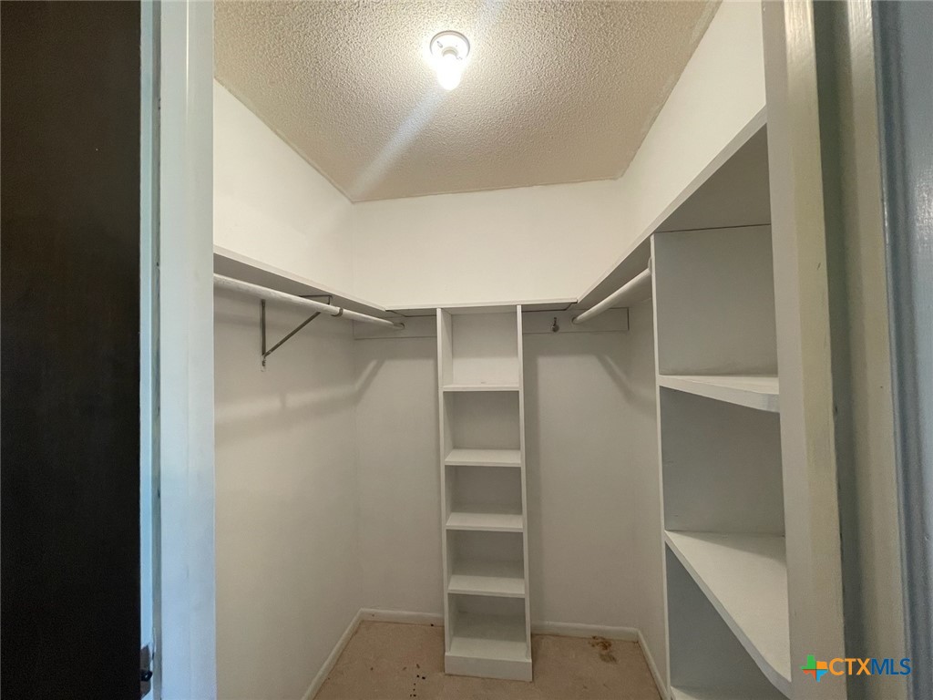 104 Skipcha Trail Lampasas, TX 76550 - Photo 21 of 34 a view of an empty walk in closet