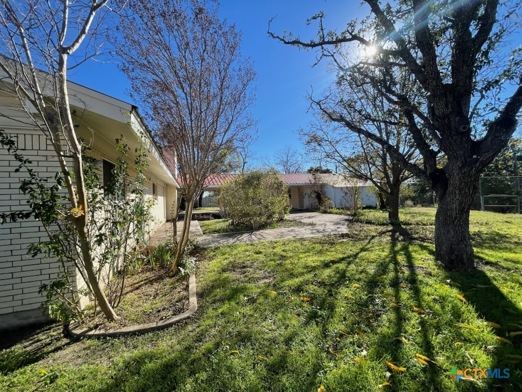 104 Skipcha Trail Lampasas, TX 76550 - Photo 3 of 34 Side of Home & backyard
104 Skipcha Trail, Texas Real Estate Sales, Leah Caruthers