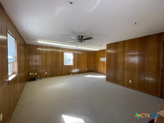 a view of a livingroom with a furniture