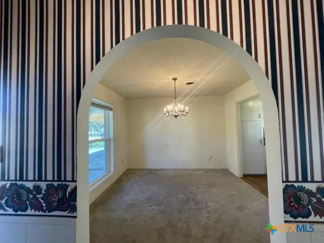 a view of a livingroom with furniture