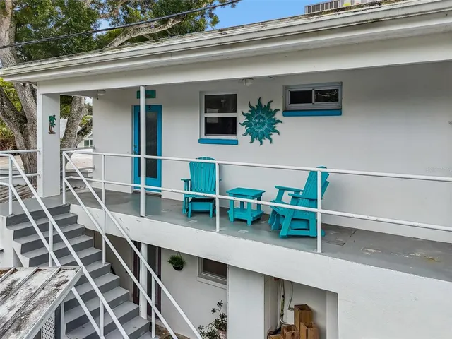 a kitchen with stainless steel appliances granite countertop a stove top oven a sink a counter space and cabinets