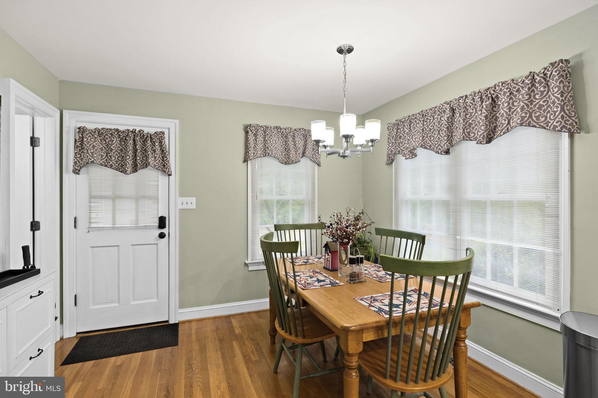 1942 Bibb Store Road Louisa, VA 23093 - Photo 18 of 61 a view of a dining room with furniture window and wooden floor