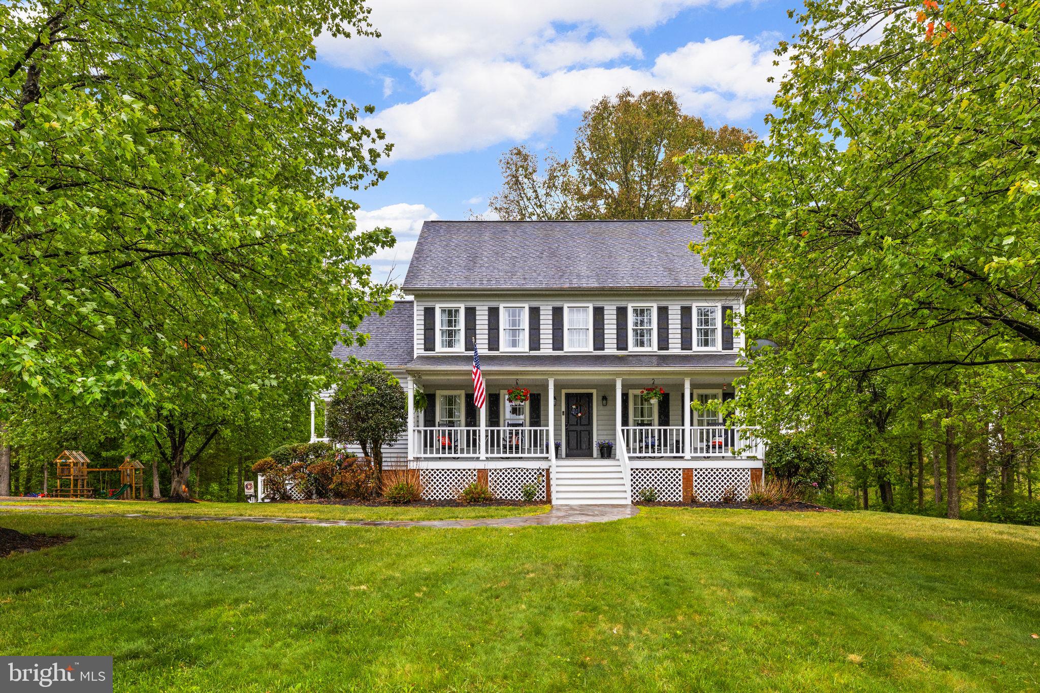 1942 Bibb Store Road Louisa, VA 23093 - Photo 2 of 61 a view of a house with a garden