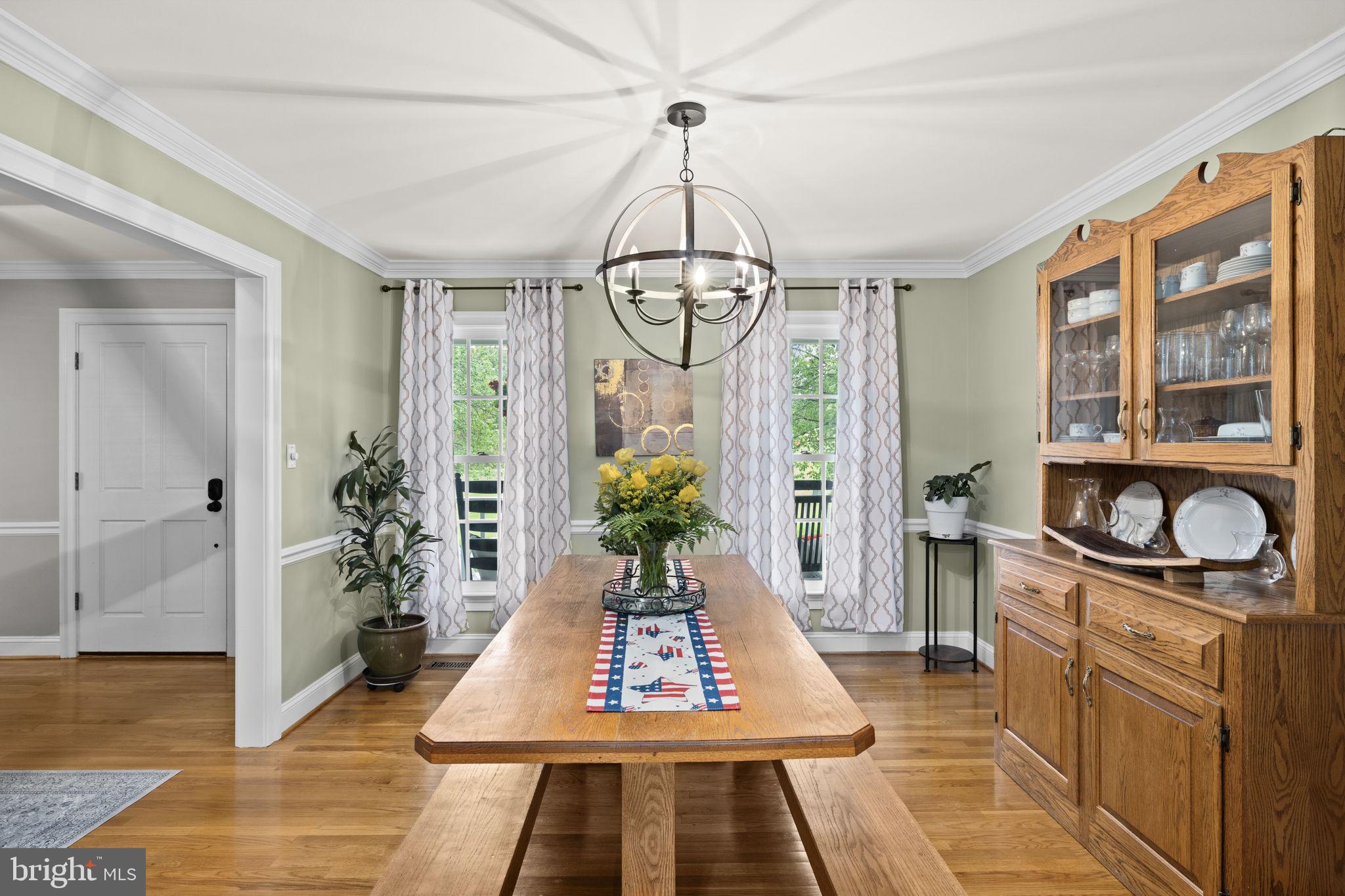 1942 Bibb Store Road Louisa, VA 23093 - Photo 21 of 61 a living room with furniture and a chandelier