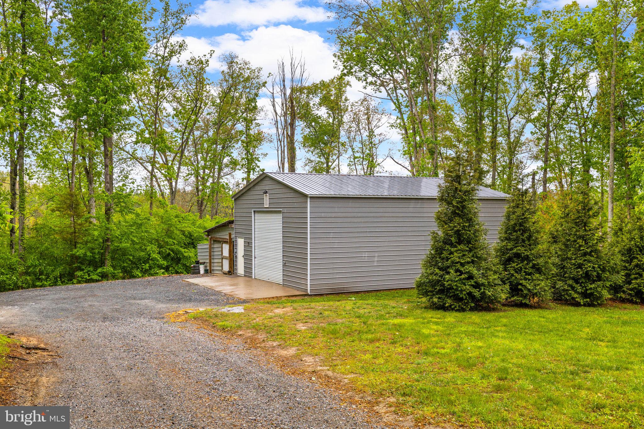 1942 Bibb Store Road Louisa, VA 23093 - Photo 45 of 61 a view of a house with backyard and garden