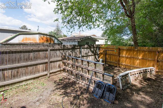46 Sunflower Road Colorado Springs, CO 80907 - Photo 31 of 35 View of fenced backyard