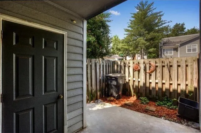 a view of entryway with wooden floor and stairs