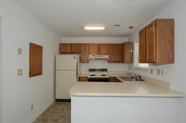 a view of a livingroom with a chandelier