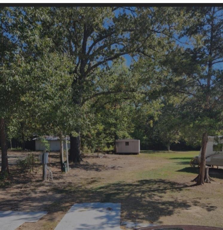 80 West G Sorsby Road, Unit W Texarkana, TX 75501 - Photo 11 of 12 a view of a backyard