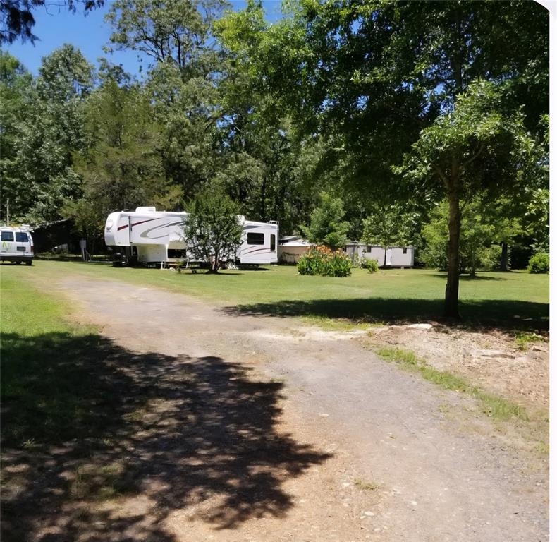80 West G Sorsby Road, Unit W Texarkana, TX 75501 - Photo 2 of 12 a view of a street with a car parked in front of it