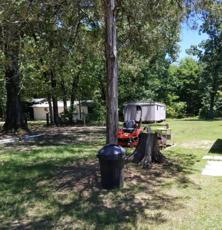 80 West G Sorsby Road, Unit W Texarkana, TX 75501 - Photo 3 of 12 a view of a garden with a slide