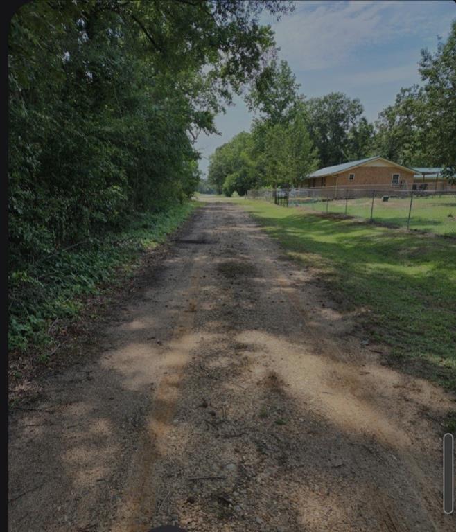 80 West G Sorsby Road, Unit W Texarkana, TX 75501 - Photo 10 of 12 a view of a field with green space