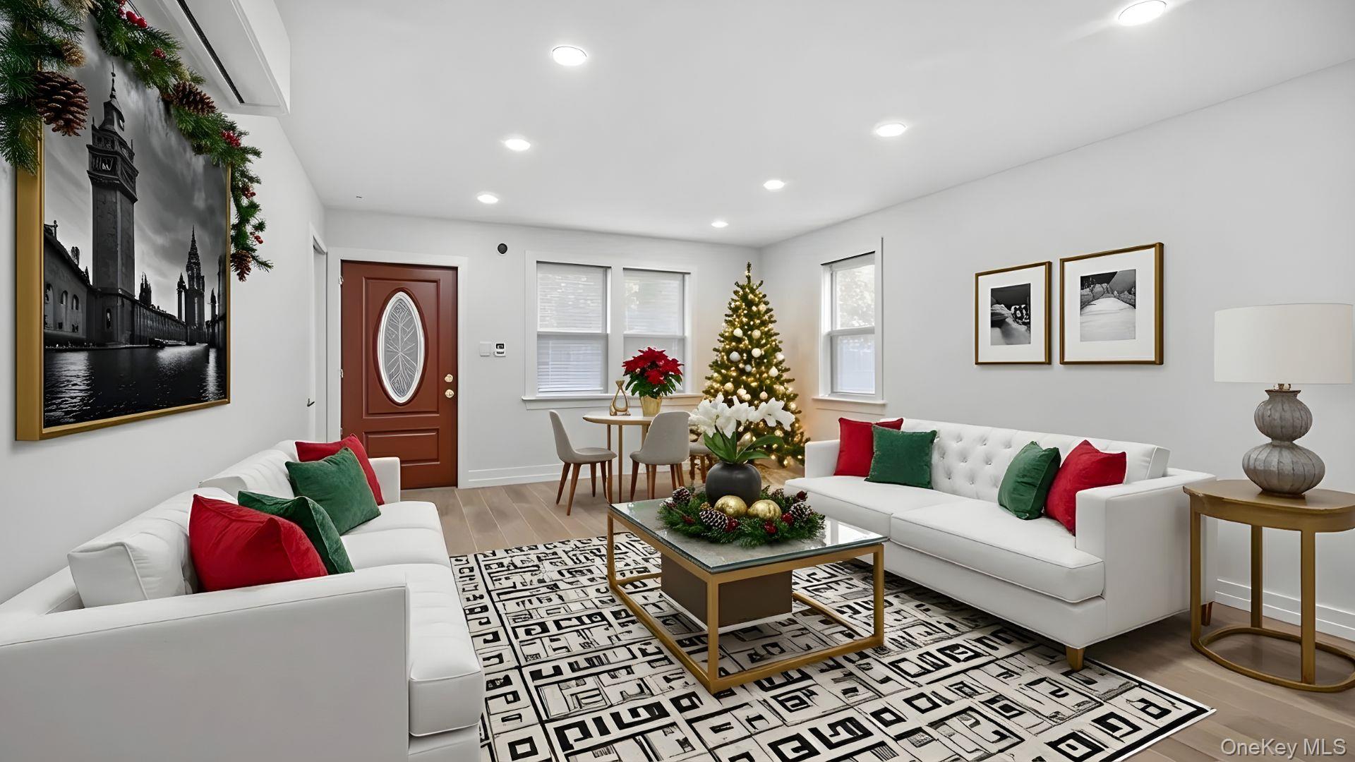 Living area featuring light wood-type flooring and recessed lighting