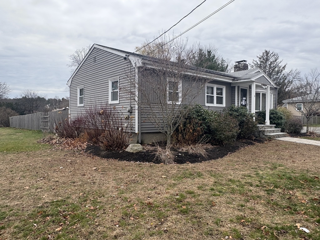 5 Wennerberg Road Middleton, MA 01949 - Photo 2 of 7 a view of a house with a yard and potted plants