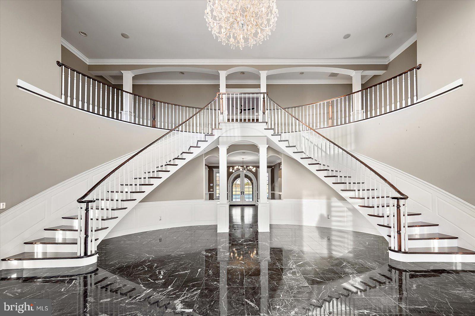 4218 Harmony Road Preston, MD 21655 - Photo 18 of 127 Stunning entry with sweeping dual curved staircase