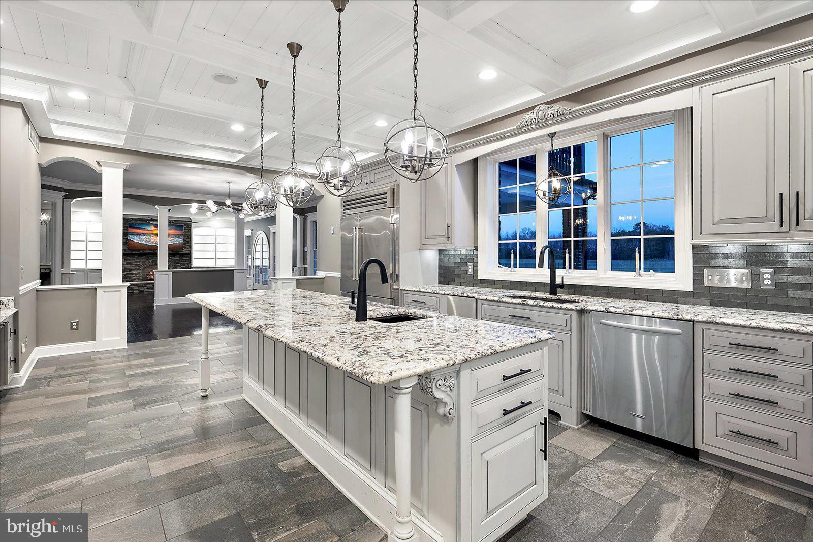 4218 Harmony Road Preston, MD 21655 - Photo 31 of 127 a kitchen with stainless steel appliances granite countertop a sink and cabinets
