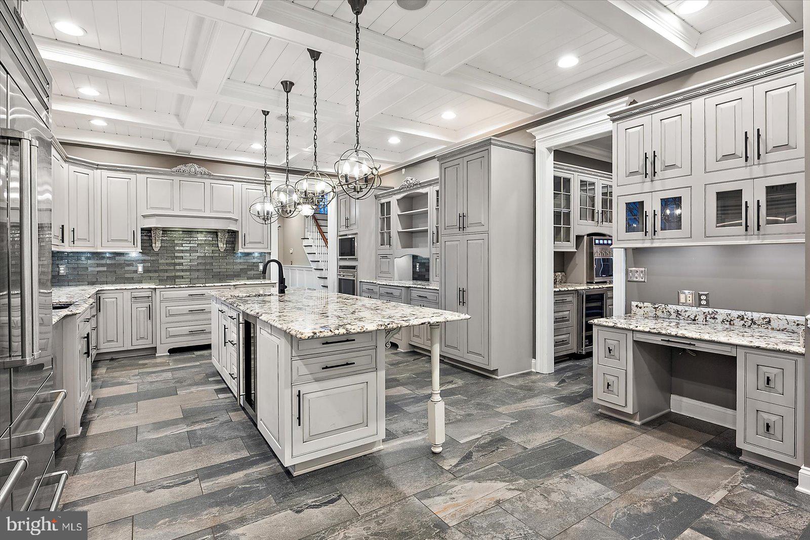 4218 Harmony Road Preston, MD 21655 - Photo 35 of 127 a kitchen with stainless steel appliances granite countertop a stove and cabinets