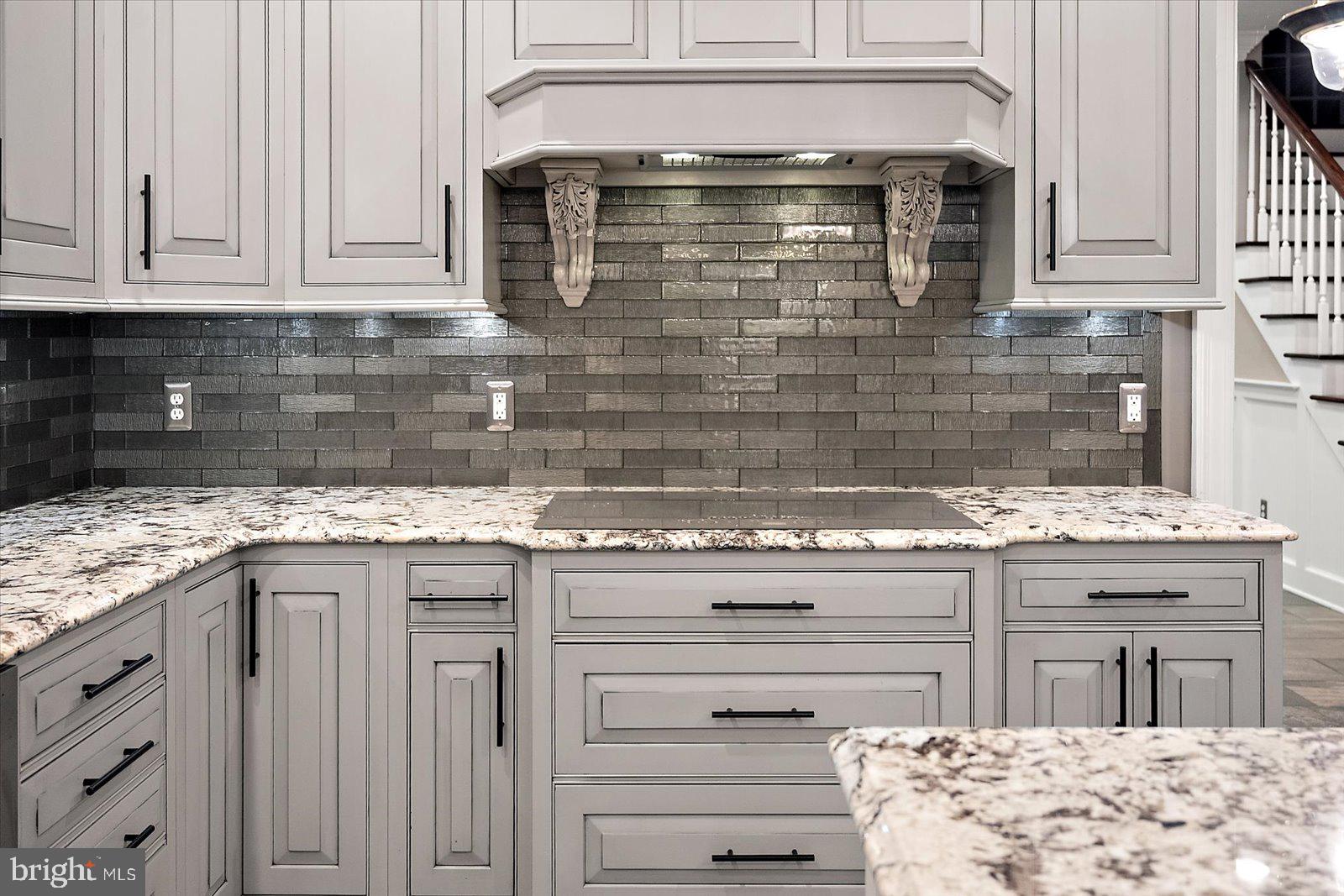 4218 Harmony Road Preston, MD 21655 - Photo 37 of 127 a kitchen with granite countertop a stove and a sink