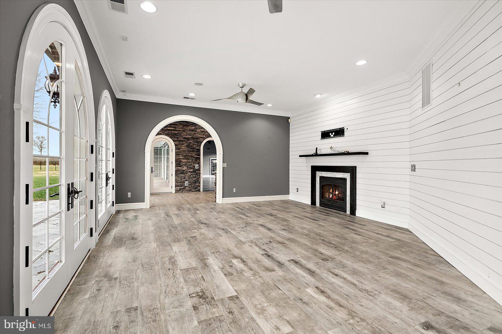 4218 Harmony Road Preston, MD 21655 - Photo 45 of 127 a view of an empty room with a fireplace