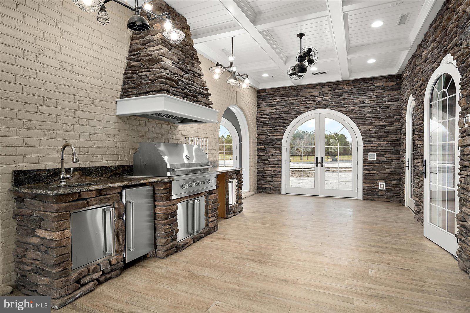 4218 Harmony Road Preston, MD 21655 - Photo 48 of 127 Indoor kitchen off hangout space and pool area