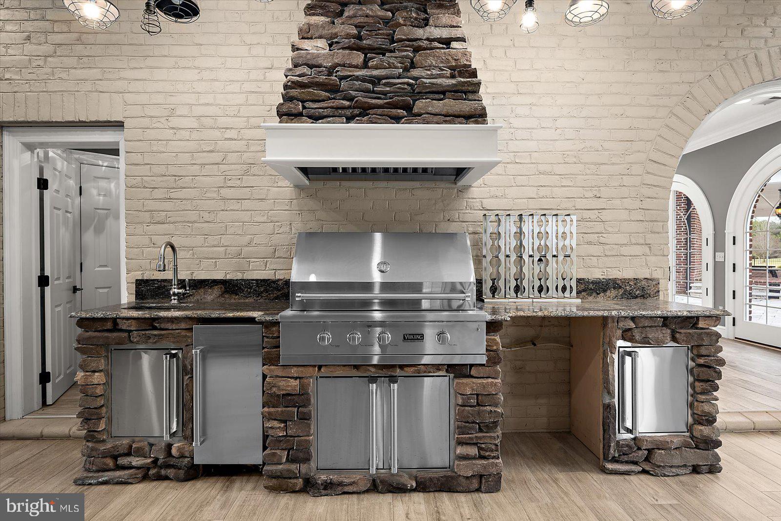 4218 Harmony Road Preston, MD 21655 - Photo 49 of 127 a kitchen with a stove and a cabinets