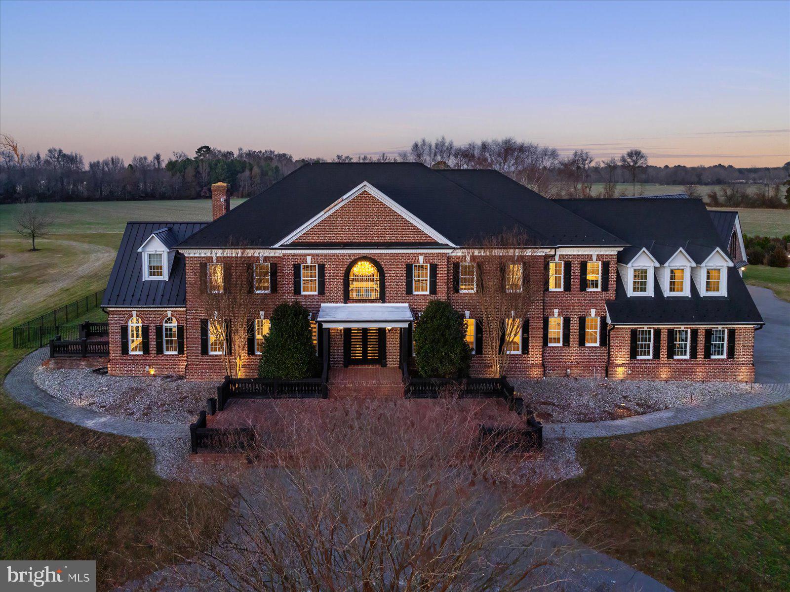 4218 Harmony Road Preston, MD 21655 - Photo 6 of 127 an aerial view of a house with a garden and lake view
