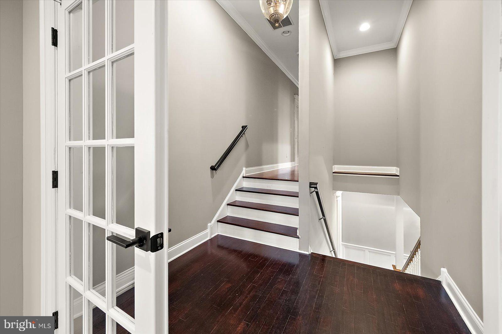 4218 Harmony Road Preston, MD 21655 - Photo 90 of 127 Rear stairway down to mudroom off garage