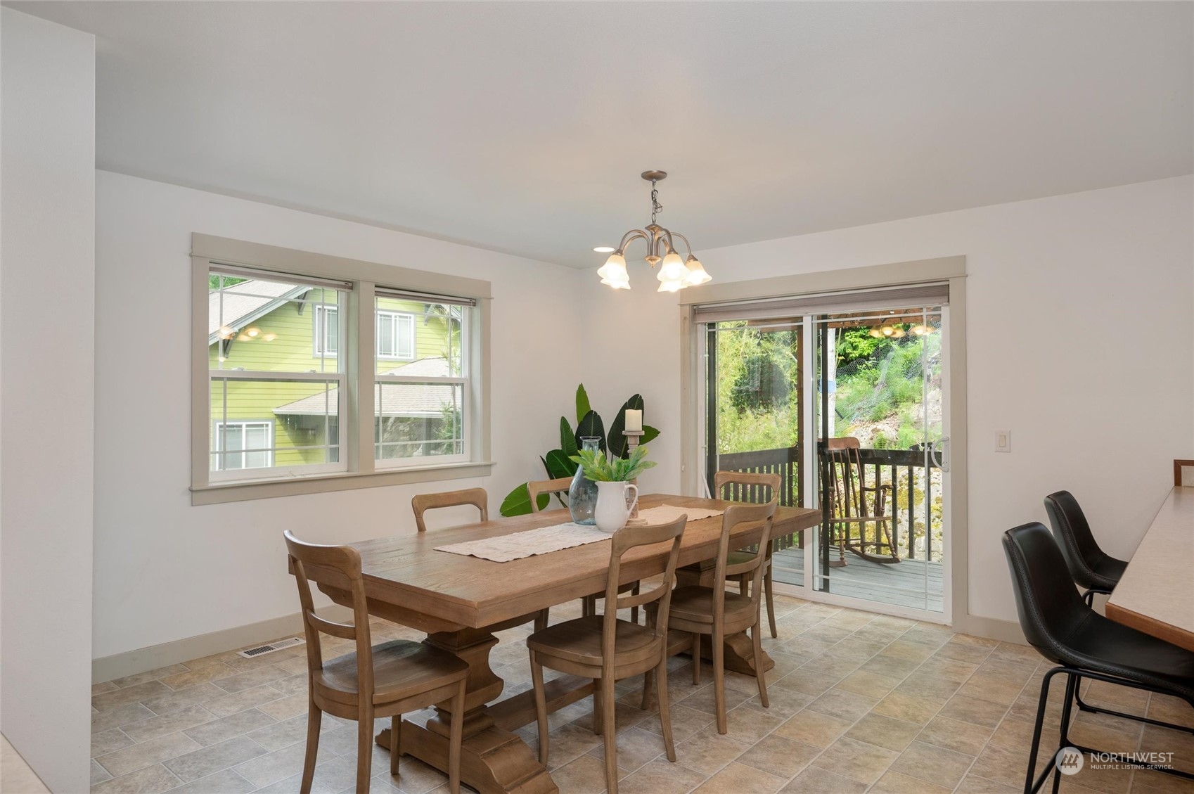 3703 Fielding Avenue Bellingham, WA 98229 - Photo 11 of 40 a view of a dining room with furniture and a chandelier