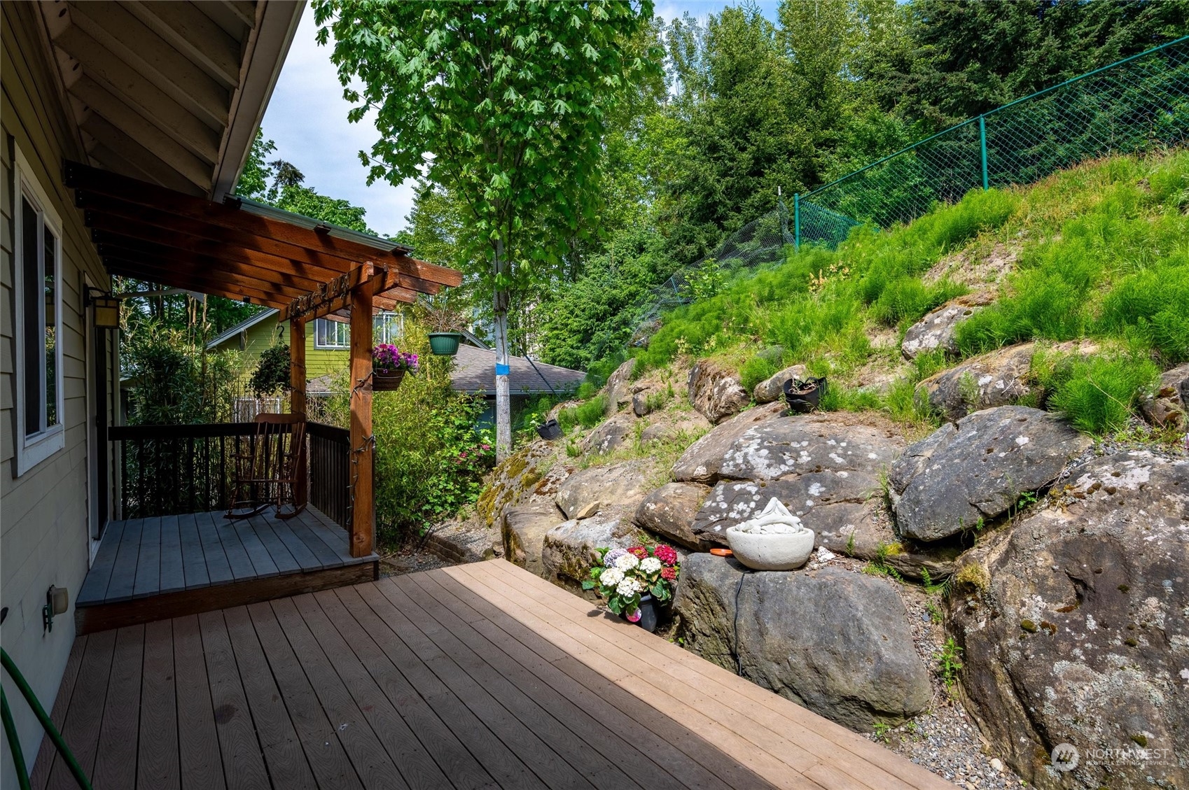 3703 Fielding Avenue Bellingham, WA 98229 - Photo 12 of 40 a view of a deck with furniture and garden