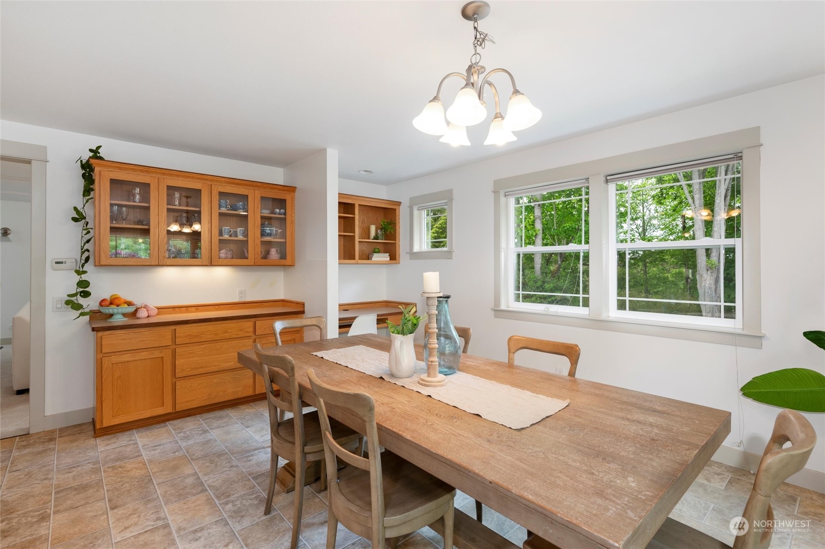 3703 Fielding Avenue Bellingham, WA 98229 - Photo 13 of 40 a kitchen with a table chairs stove and refrigerator